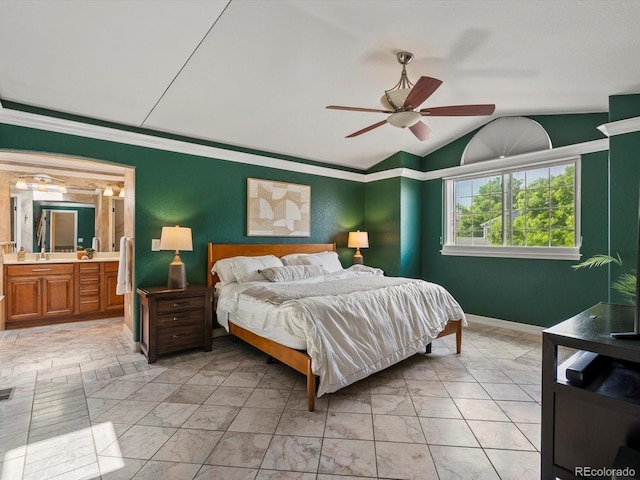 10954 W 100th Way, Broomfield, CO 80021 - bedroom with light marble finish floors, lofted ceiling, ceiling fan, and ensuite bath