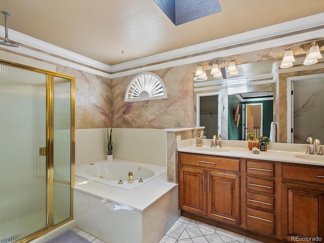 10954 W 100th Way, Broomfield, CO 80021 - full bathroom with a tub with jets, a stall shower, double vanity, ornamental molding, and a skylight