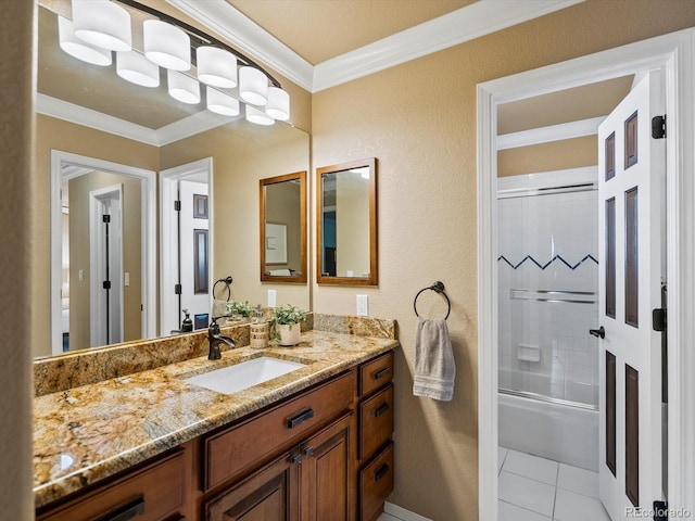 10954 W 100th Way, Broomfield, CO 80021 - full bathroom featuring vanity, ornamental molding, enclosed tub / shower combo, and tile patterned flooring