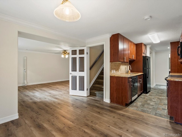 10954 W 100th Way, Broomfield, CO 80021 - kitchen with black appliances, beverage cooler, open floor plan, ceiling fan, and backsplash