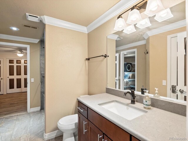 10954 W 100th Way, Broomfield, CO 80021 - bathroom featuring crown molding, vanity, a ceiling fan, and recessed lighting