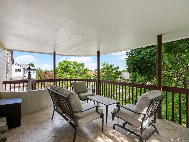 10954 W 100th Way, Broomfield, CO 80021 - wooden terrace with an outdoor hangout area