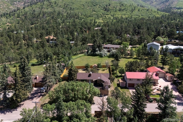4665 Fox Rd, Cascade, CO 80809 - aerial view of property's location featuring a heavily wooded area