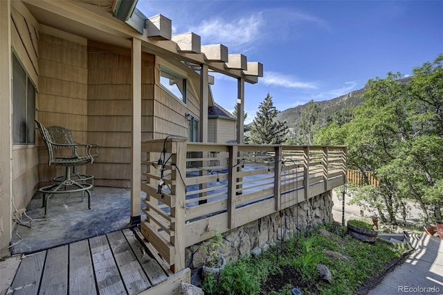 4665 Fox Rd, Cascade, CO 80809 - wooden deck with a mountain view