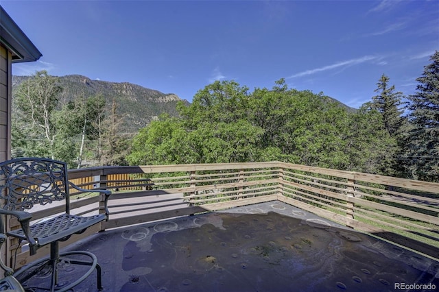 4665 Fox Rd, Cascade, CO 80809 - view of patio featuring a mountain view and a view of trees