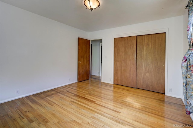 4665 Fox Rd, Cascade, CO 80809 - unfurnished bedroom with light wood-style flooring and a closet