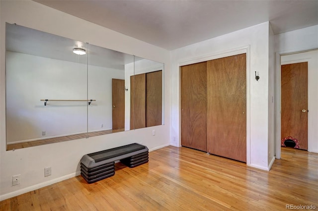 4665 Fox Rd, Cascade, CO 80809 - unfurnished bedroom with baseboards and wood finished floors