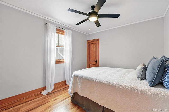 3611 N Vine St, Denver, CO 80205 - bedroom featuring ornamental molding, light wood-style floors, a ceiling fan, and baseboards