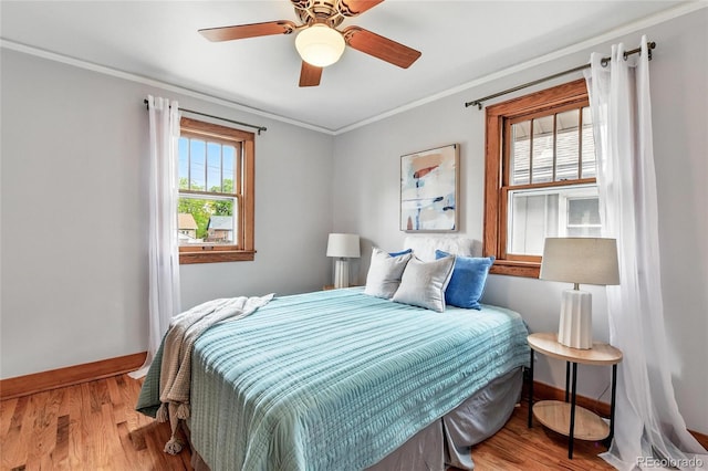 3611 N Vine St, Denver, CO 80205 - bedroom featuring baseboards, ornamental molding, wood finished floors, and ceiling fan