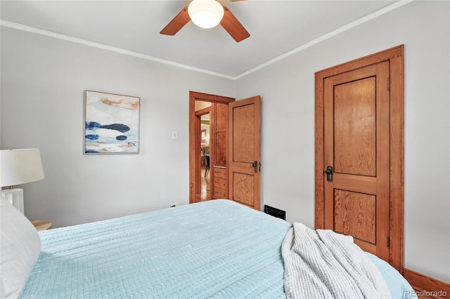 3611 N Vine St, Denver, CO 80205 - bedroom with crown molding and a ceiling fan