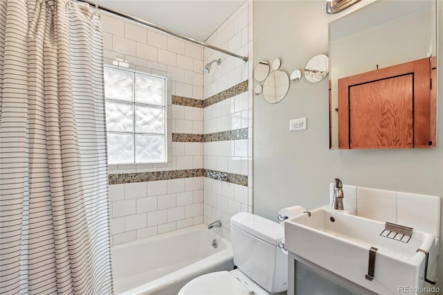 3611 N Vine St, Denver, CO 80205 - full bathroom featuring shower / bath combo with shower curtain, toilet, and vanity