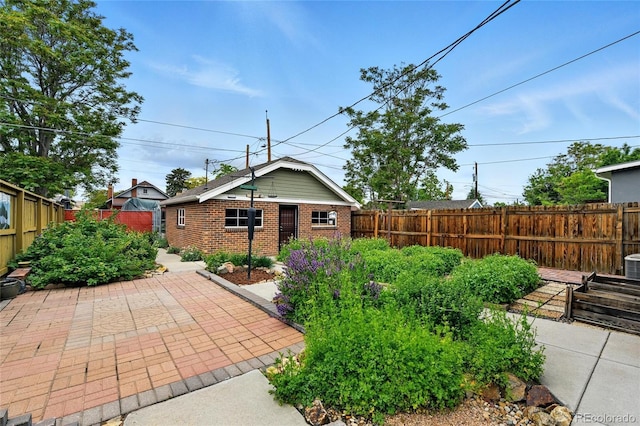 3611 N Vine St, Denver, CO 80205 - fenced backyard featuring a patio area