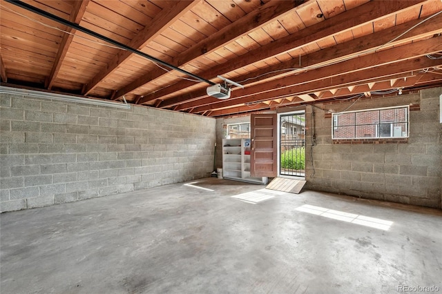 3611 N Vine St, Denver, CO 80205 - garage with a garage door opener and concrete block wall