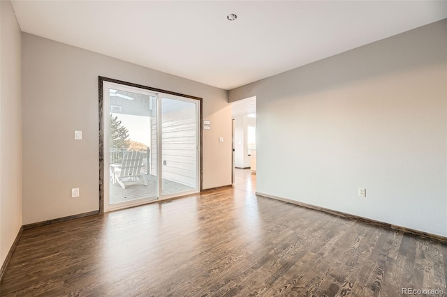 empty room featuring hardwood / wood-style flooring