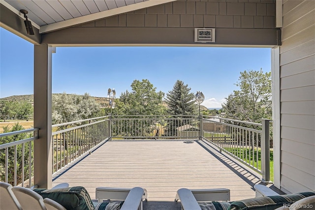 view of patio featuring a balcony