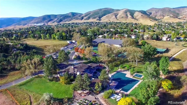 drone / aerial view featuring a mountain view