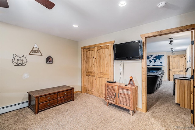 423 Prunes Pl, Fairplay, CO 80440 - bedroom featuring light carpet, a baseboard heating unit, recessed lighting, baseboards, and ceiling fan