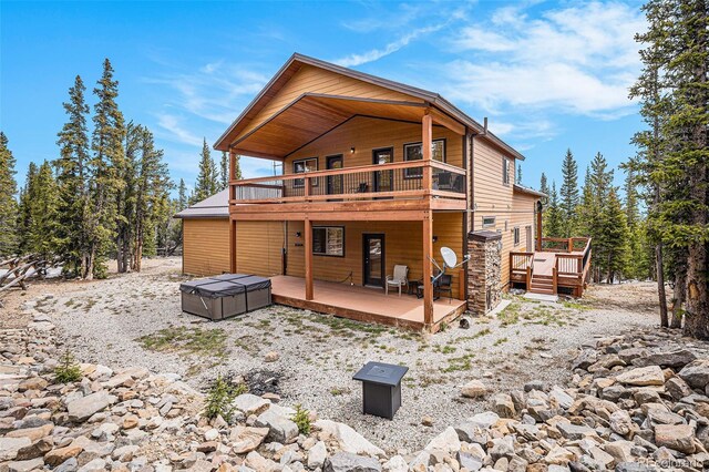 423 Prunes Pl, Fairplay, CO 80440 - back of house with a deck, a hot tub, and a patio area