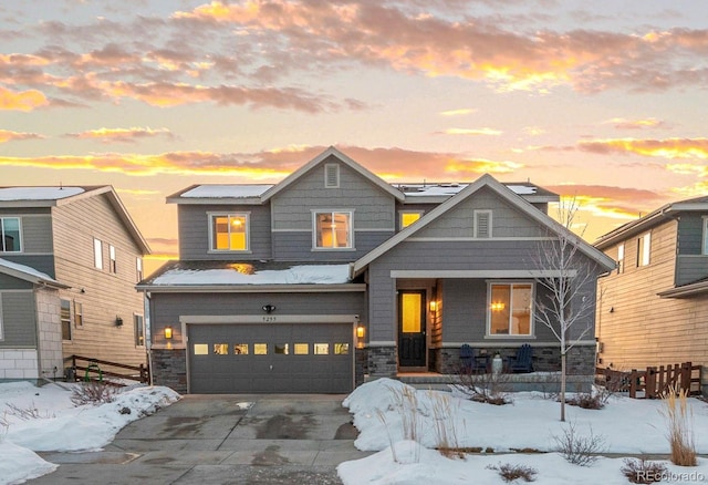 craftsman-style house featuring a garage and a porch