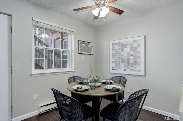 dining room featuring a textured ceiling, an AC wall unit, a baseboard heating unit, and dark wood-type flooring