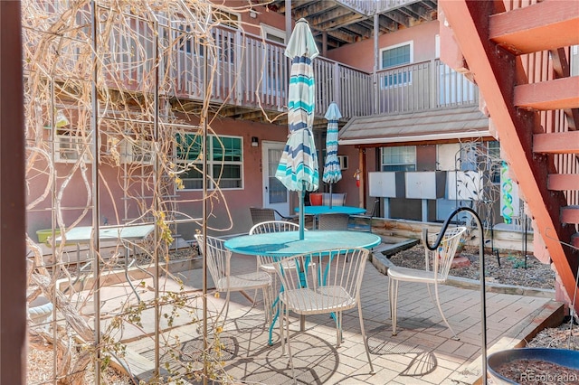 view of patio featuring outdoor dining space