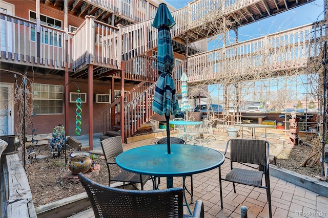 view of patio featuring outdoor dining space