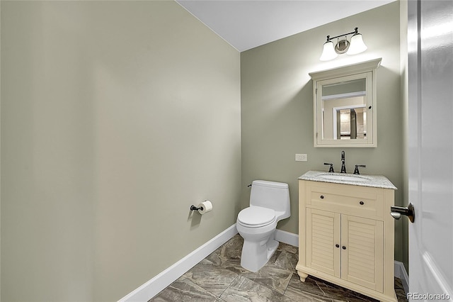 300 W 11th Ave Unit 8C, Denver, CO 80204 - half bath featuring marble look tile flooring and vanity