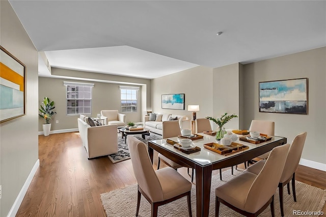 300 W 11th Ave Unit 8C, Denver, CO 80204 - dining area with baseboards and light wood-style floors