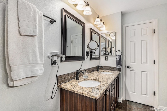 bathroom featuring backsplash and vanity