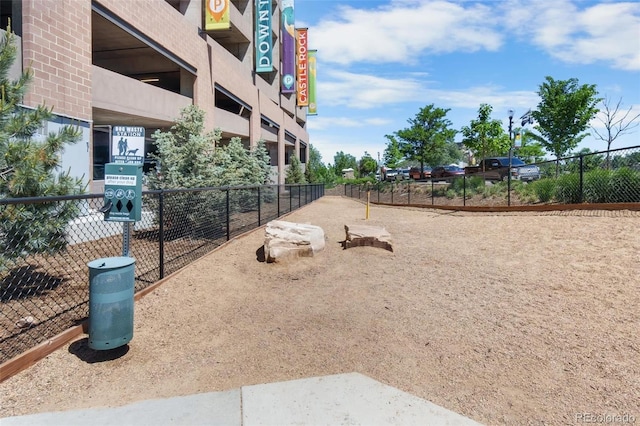surrounding community featuring fence