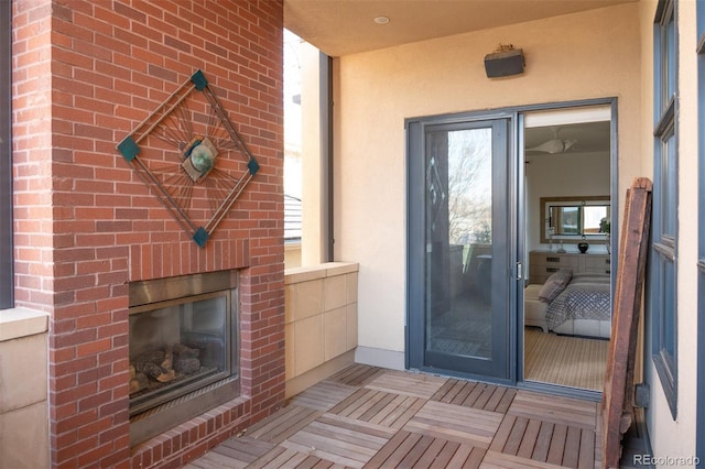 doorway to property featuring a fireplace