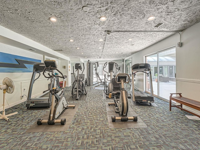 workout area with dark colored carpet, visible vents, and recessed lighting