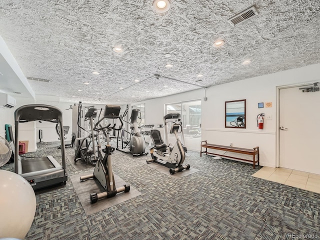 workout area with carpet, visible vents, and recessed lighting