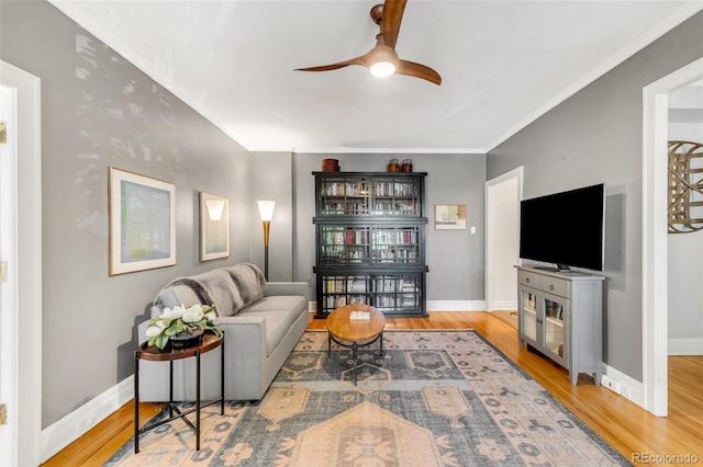 99 S Downing St Unit 105, Denver, CO 80209 - living area with ceiling fan and wood finished floors
