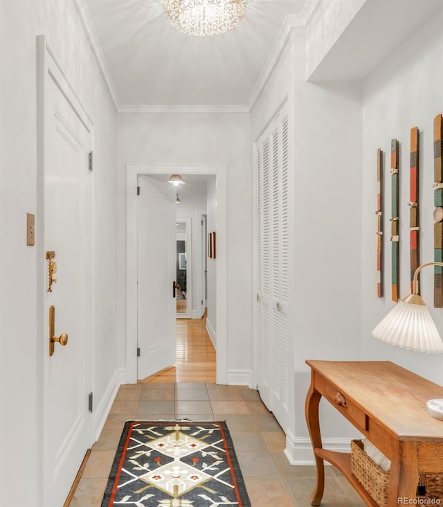 99 S Downing St Unit 105, Denver, CO 80209 - foyer entrance with light tile patterned floors and crown molding