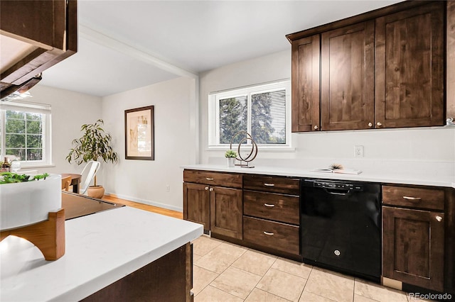 797 W Briarwood Ave, Littleton, CO 80120 - kitchen with dishwasher, light countertops, dark brown cabinetry, and light tile patterned floors