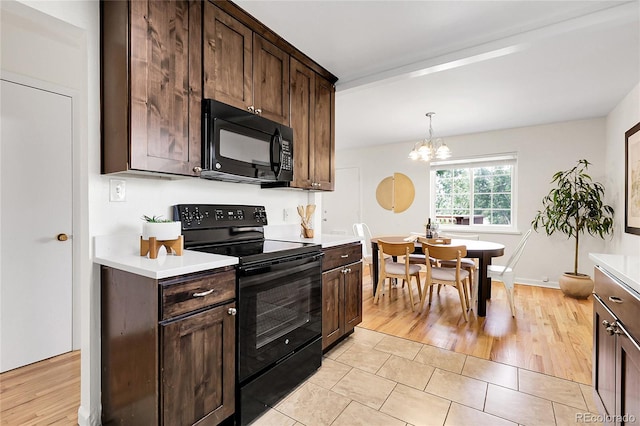 797 W Briarwood Ave, Littleton, CO 80120 - kitchen featuring black appliances, light countertops, dark brown cabinetry, and a chandelier