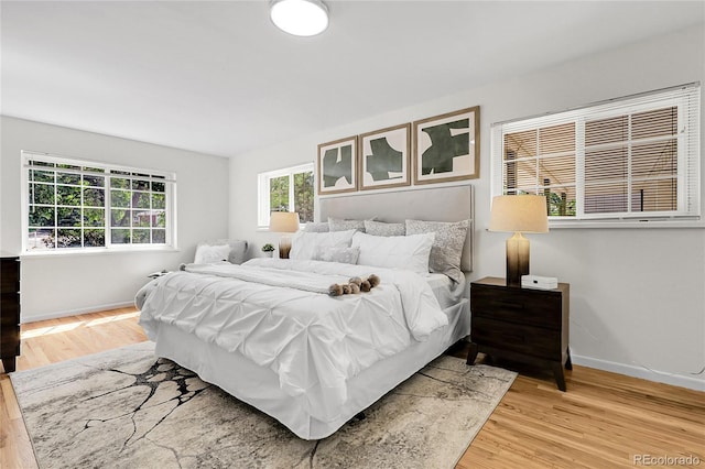 797 W Briarwood Ave, Littleton, CO 80120 - bedroom with baseboards and light wood-type flooring