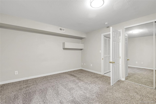 797 W Briarwood Ave, Littleton, CO 80120 - basement featuring carpet flooring, baseboards, and a textured ceiling