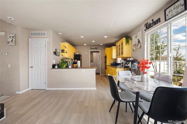 20414 E 55th Pl, Denver, CO 80249 - dining area with recessed lighting, baseboards, and light wood-style flooring