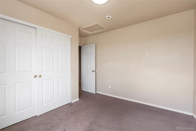 20414 E 55th Pl, Denver, CO 80249 - unfurnished bedroom featuring carpet flooring, baseboards, attic access, and a closet