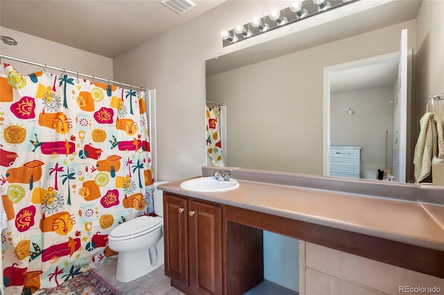 20414 E 55th Pl, Denver, CO 80249 - bathroom with tile patterned floors, toilet, vanity, and a shower with curtain