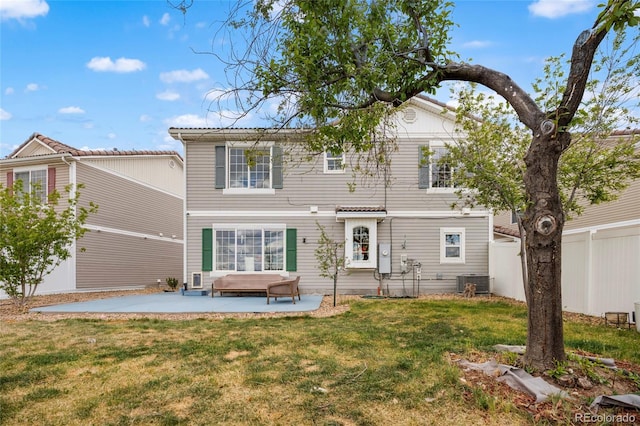 20414 E 55th Pl, Denver, CO 80249 - back of house featuring a patio area and central AC