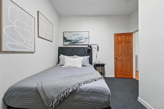 carpeted bedroom with baseboards