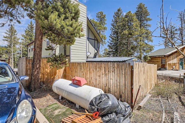view of side of property with fence