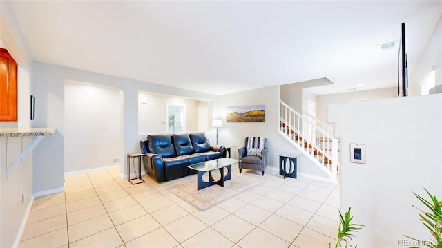 7270 Marmot Ridge Pl, Littleton, CO 80125 - living area with stairway and light tile patterned flooring