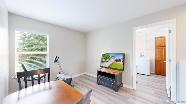 7270 Marmot Ridge Pl, Littleton, CO 80125 - office space with light wood-type flooring and washer / clothes dryer