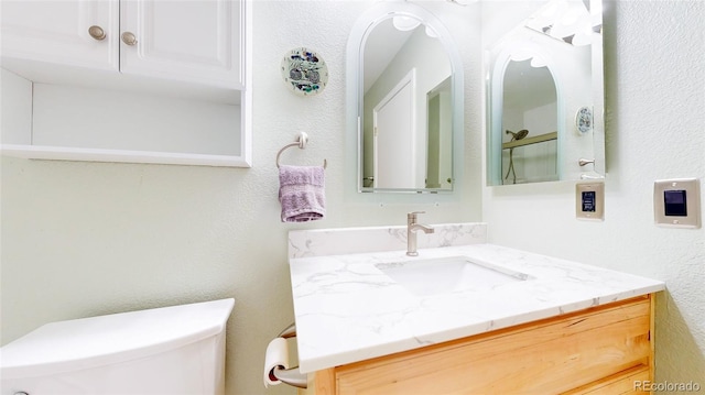7270 Marmot Ridge Pl, Littleton, CO 80125 - bathroom with toilet and vanity