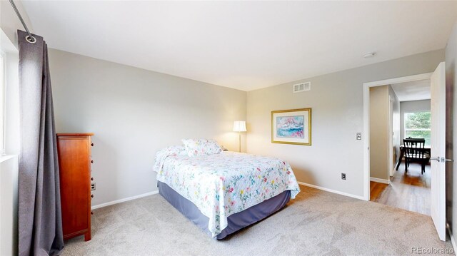 7270 Marmot Ridge Pl, Littleton, CO 80125 - carpeted bedroom featuring baseboards
