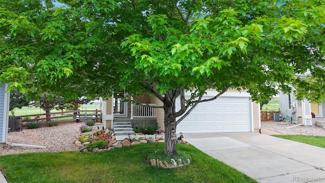 7270 Marmot Ridge Pl, Littleton, CO 80125 - view of property hidden behind natural elements featuring a garage, a porch, and concrete driveway